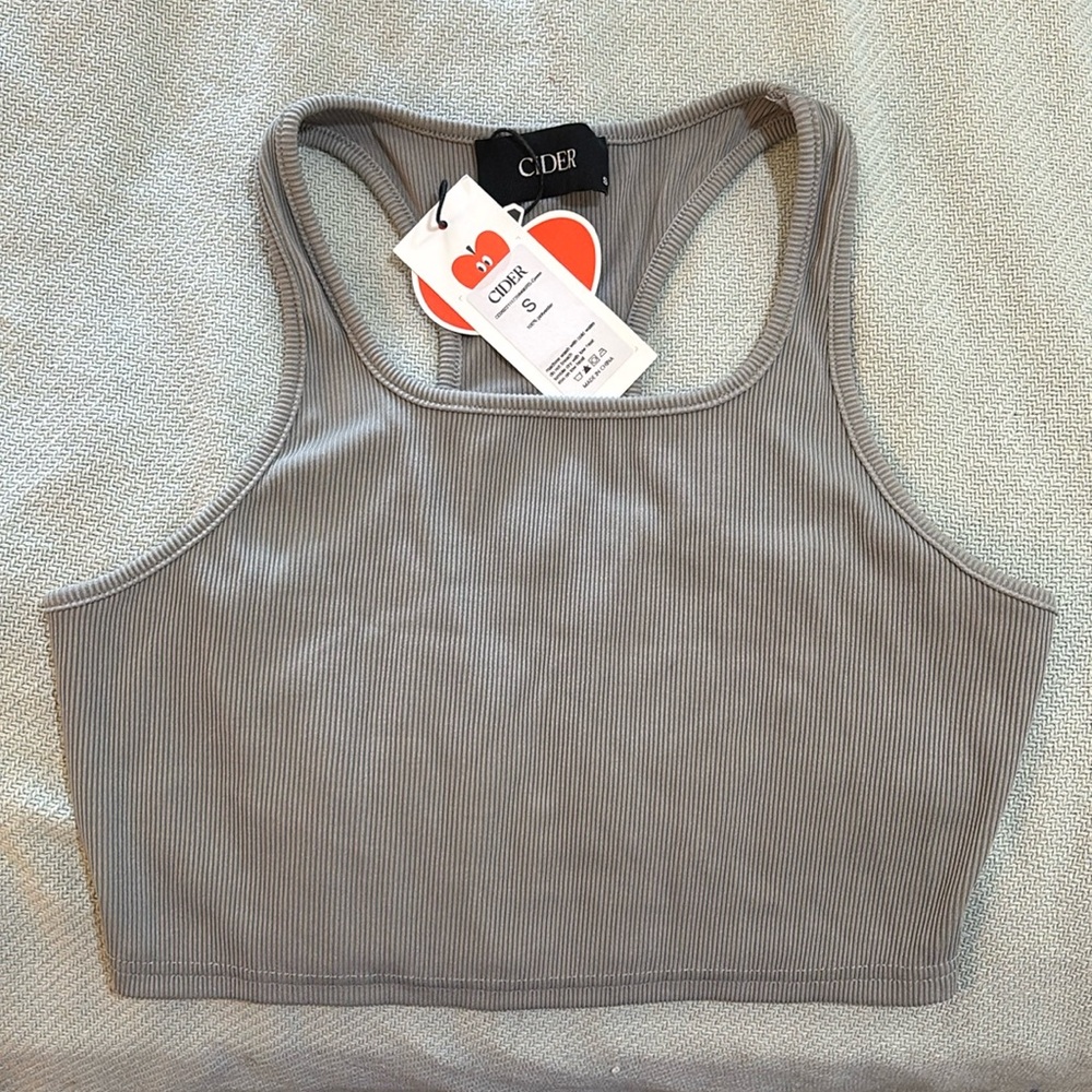 Light beige tank top; athletic top